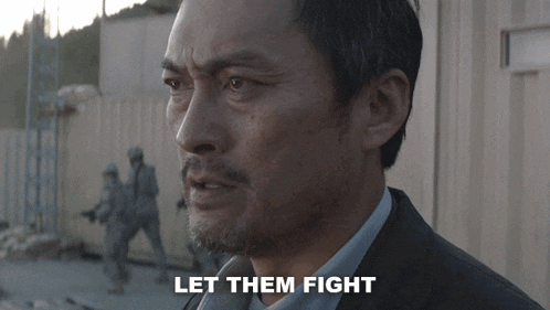 Ken Watanabe saying 'Let them fight' in a movie scene.